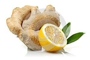 Fresh ginger and lemon with leaves on white background