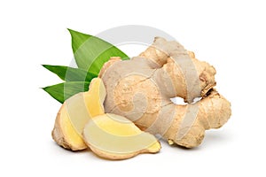 Fresh ginger rhizome with sliced and green leaves photo