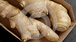 Fresh ginger root as a culinary natural medicinal ingredient in a paper box