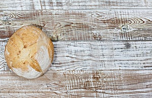 Fresh gluten free bread on a wooden surface in provence style