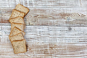 Fresh gluten free bread on a wooden surface in provence style