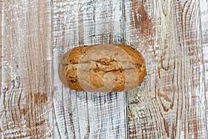 Fresh gluten free bread on a wooden surface in provence style