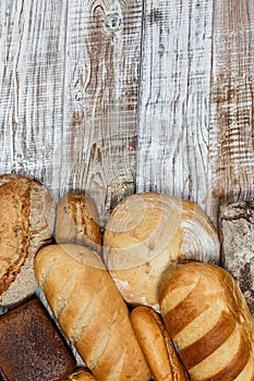 Fresh gluten free bread on a wooden surface in provence style