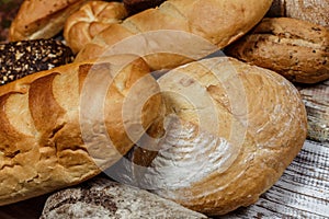 Fresh gluten free bread on a wooden surface in provence style