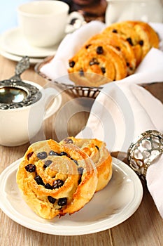 Fresh gluten free sweet swirl buns with raisins