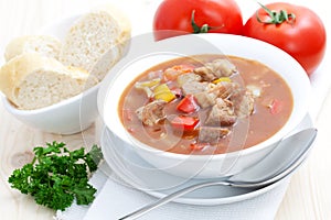 Fresh goulash with baguette