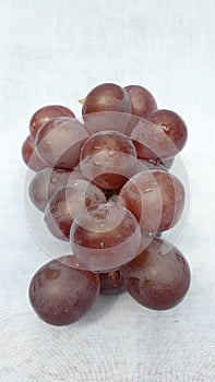 Fresh grape or anggur on white background