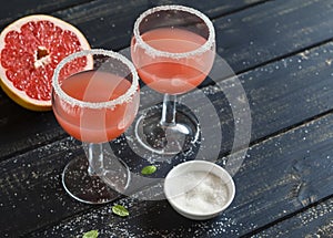 Fresh grapefruit juice in glass beakers