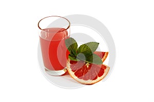 Fresh grapefruit juice with mint in a glass cup isolated on white background. Grapefruit fresh and juice on a white background, vi