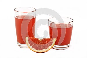 Fresh grapefruit juice with mint in a glass cup isolated on white background. Grapefruit fresh and juice on a white background, vi