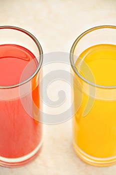 Fresh grapefruit and orange juice. Vitamins for health.