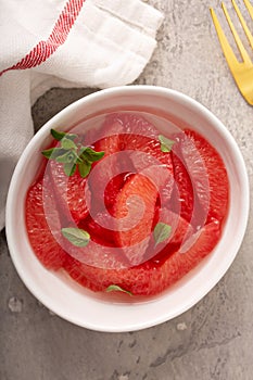 Fresh grapefruit slices in a bowl