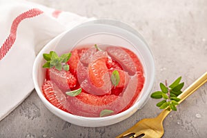 Fresh grapefruit slices in a bowl