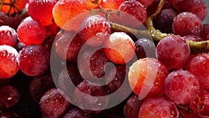 Fresh Grapes rotaiting on plate