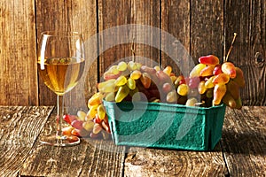 Fresh grapes and white wine