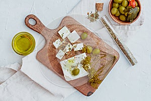 Fresh Greek Feta Cheese with olives... Healthy ingredient for cooking salad photo