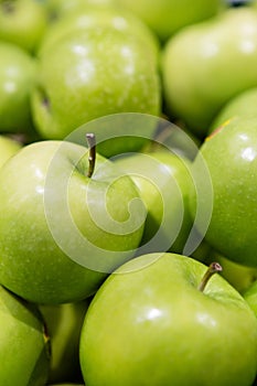 Fresh green apples in a supermarket