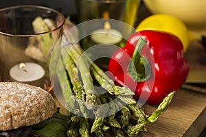 Fresh green asparagus spears with red bell pepper