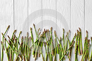 Fresh green asparagus on a wooden table