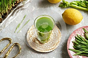 Fresh green barley grass juice with homegrown blades