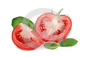 Fresh green basil leaves and cut tomato on white background