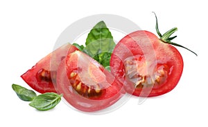 Fresh green basil leaves with cut tomato on white background