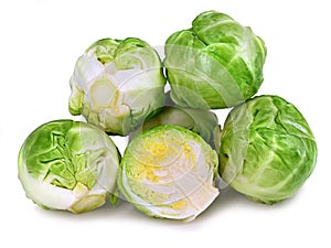 fresh green brussels sprouts isolated on white background, close up of healthy cabbage vegetable