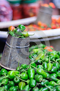 Fresh green chili pepper for sale on one of the many outdoor markets in Asia.