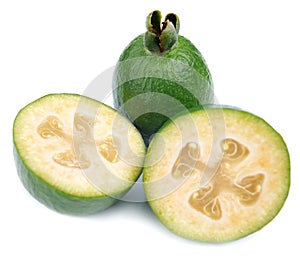 Fresh green feijoa on a white background, isolated. Tropical fruit feijoa whole and half