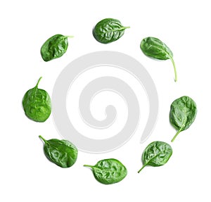 Fresh green healthy baby spinach leaves on white background, top view