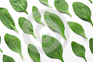 Fresh green healthy spinach leaves on  background, top view