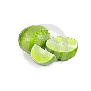 Fresh green juicy limes and lime slices isolated on white background.