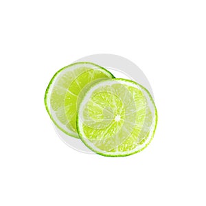 Fresh green juicy limes and lime slices isolated on white background.