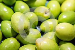 Fresh green jujubes in a supermarket