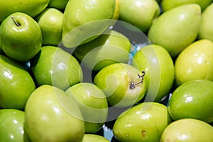 Fresh green jujubes in a supermarket