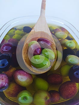 Fresh green olives in a bowl