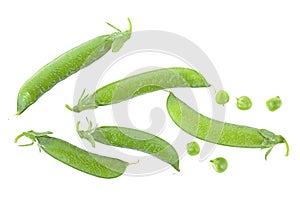 Fresh green pea pods and peas on white background, top view
