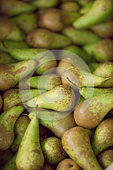 Fresh green pears at the weekly market