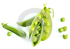 Fresh green peas isolated on white