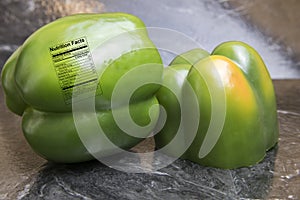 Fresh green pepper with nutrition label