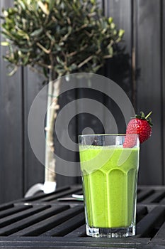 Fresh Green Smoothie with Red Strawberry