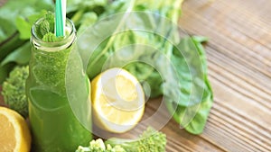 Fresh green smoothie on the wooden table