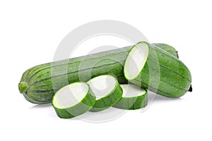 Fresh green sponge gourd or luffa with slice isolated on white