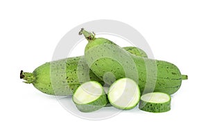 Fresh green sponge gourd or luffa with slice isolated on white