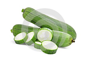 Fresh green sponge gourd or luffa with slice isoled on white