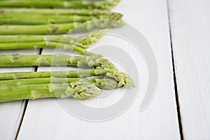 Fresh green sprout of asparagus on table