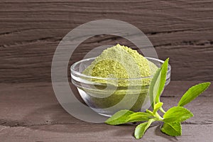 Fresh green Stevia herb and extract powder - Stevia rebaudiana.