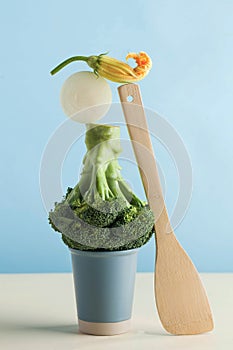 Fresh green vegetables, broccoli. The balance of the floating supply. Art concept of healthy nutrition. Copy space