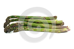 Fresh green and violet asparagus isolated on white background