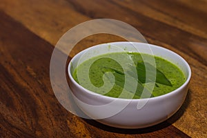 Fresh green wild garlic soup in the spring